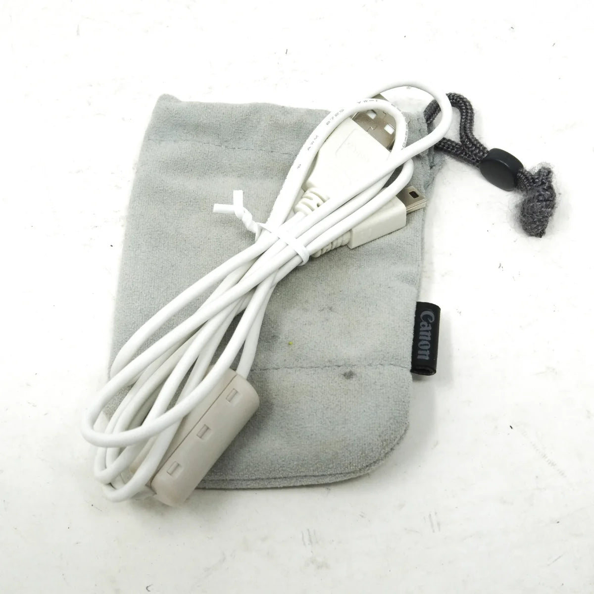 Used Canon EOS M Mirrorless camera - cable and case 