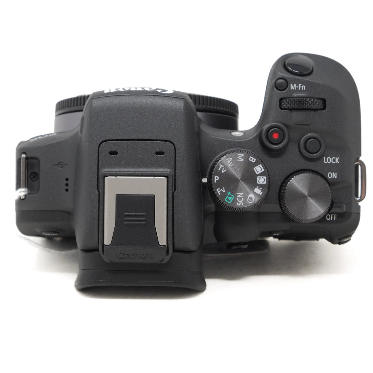 Top view of a Canon camera on a white background