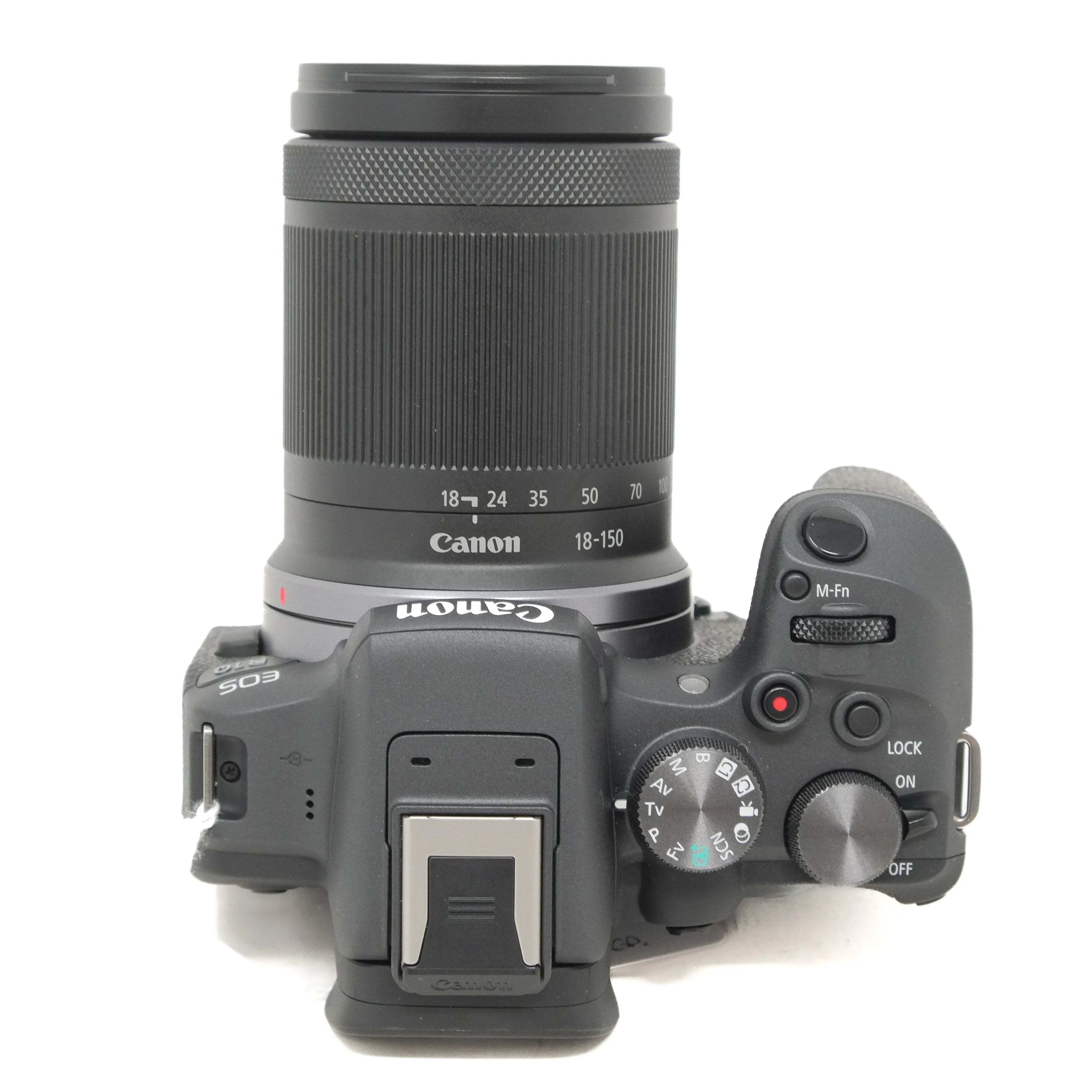 Canon camera with lens on a white background