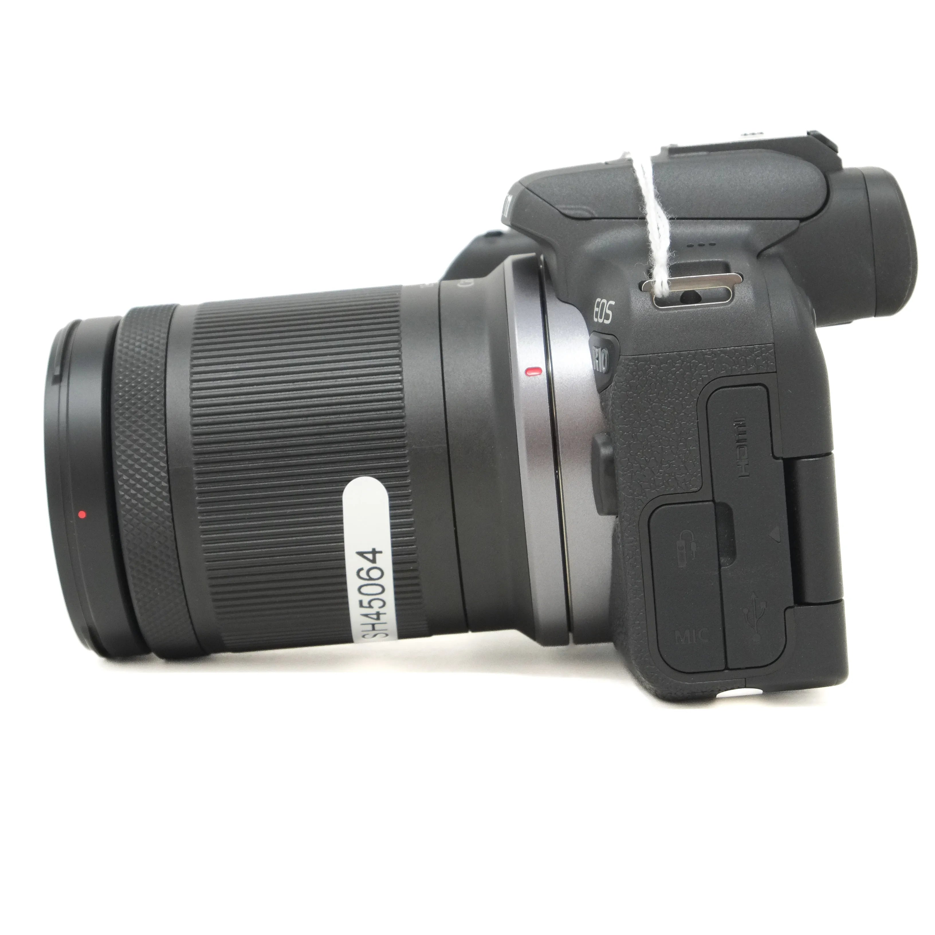 Black camera with lens on a white background