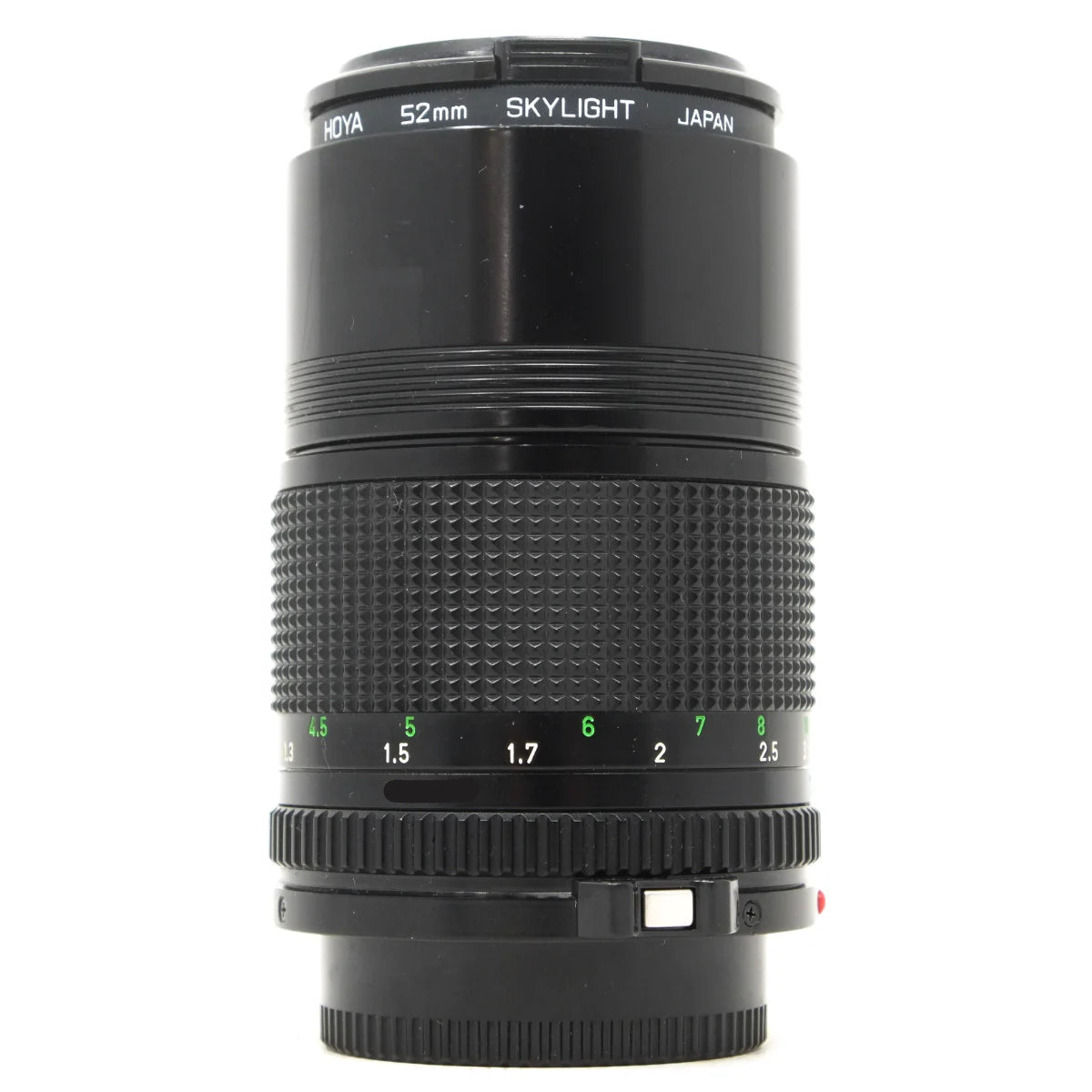 Used Canon FD 135mm F3.5 film camera lens - side angle 