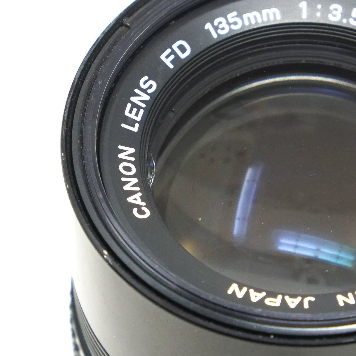 Used Canon FD 135mm F3.5 film camera lens - small crack 
