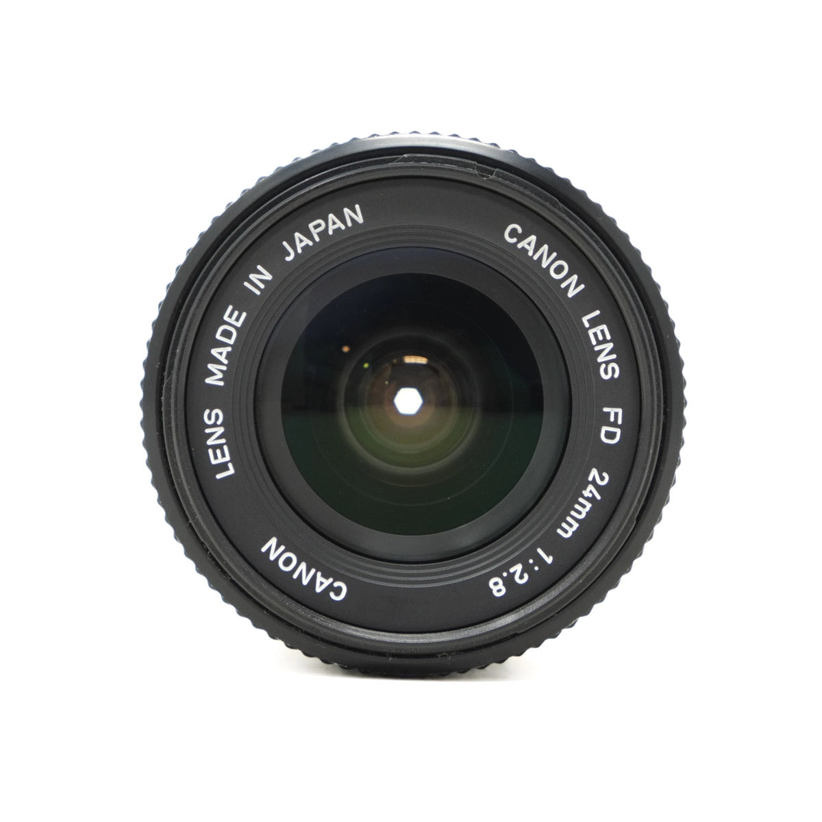 Canon camera lens with 'Made in Japan' and 'Canon' branding on a white background