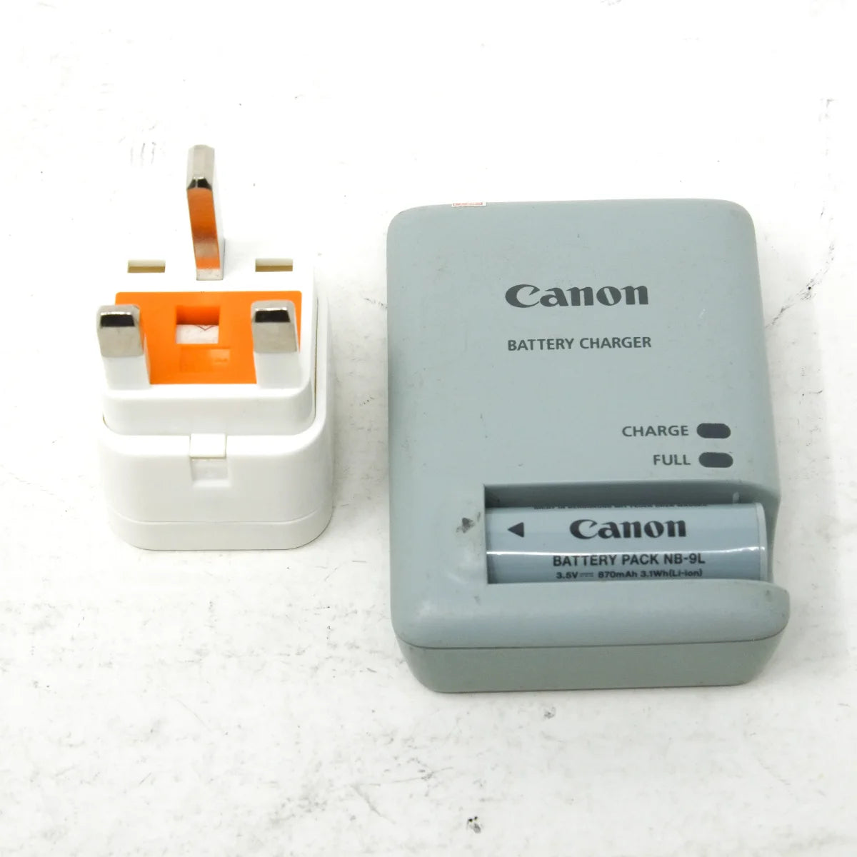Used Canon Ixus 510 HS Digital compact camera - plug, charger and battery