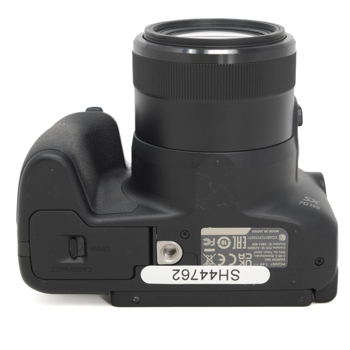 Black camera body with lens on a white background
