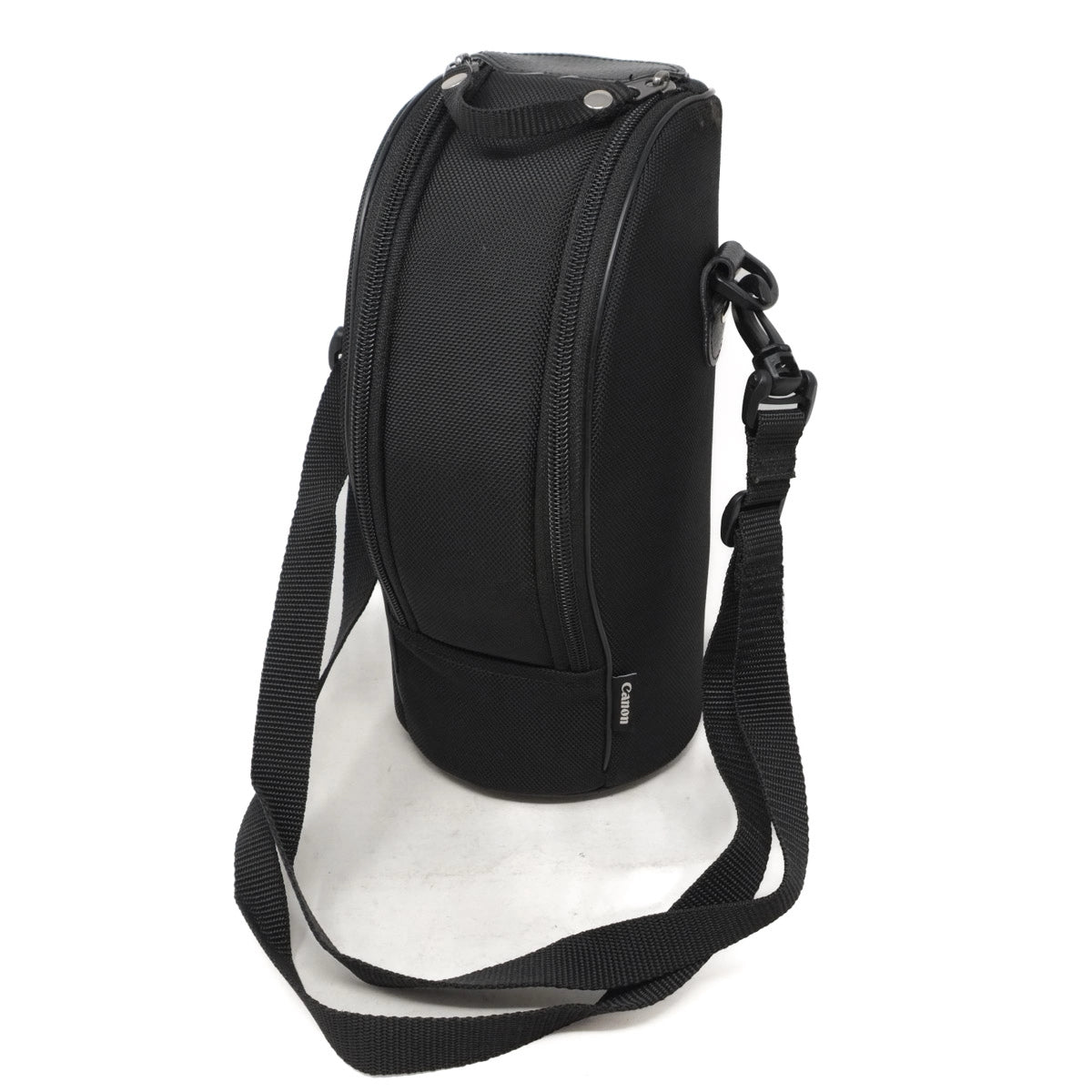 Black camera lens bag with a strap on a white background