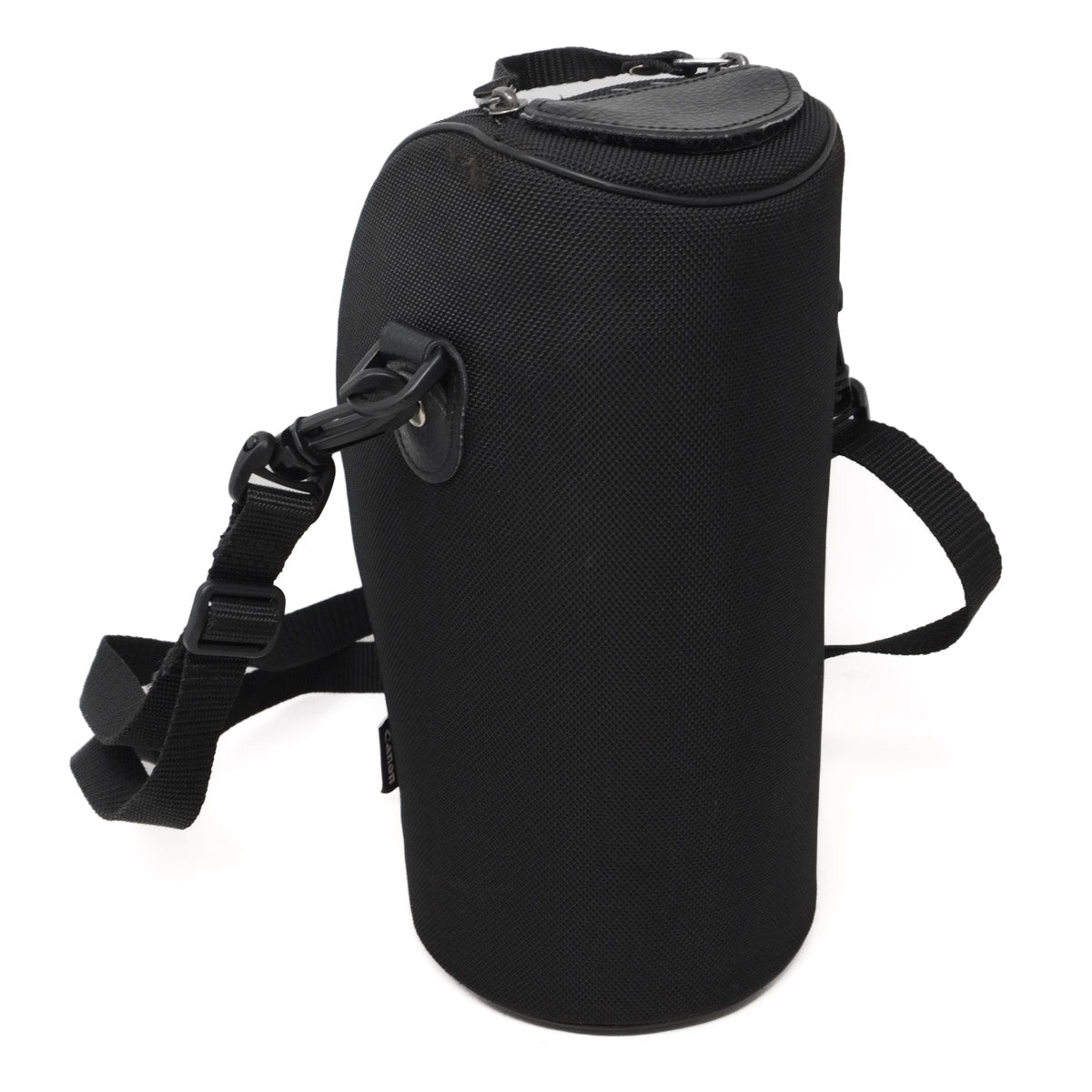 Black cylindrical bag with a strap on a white background