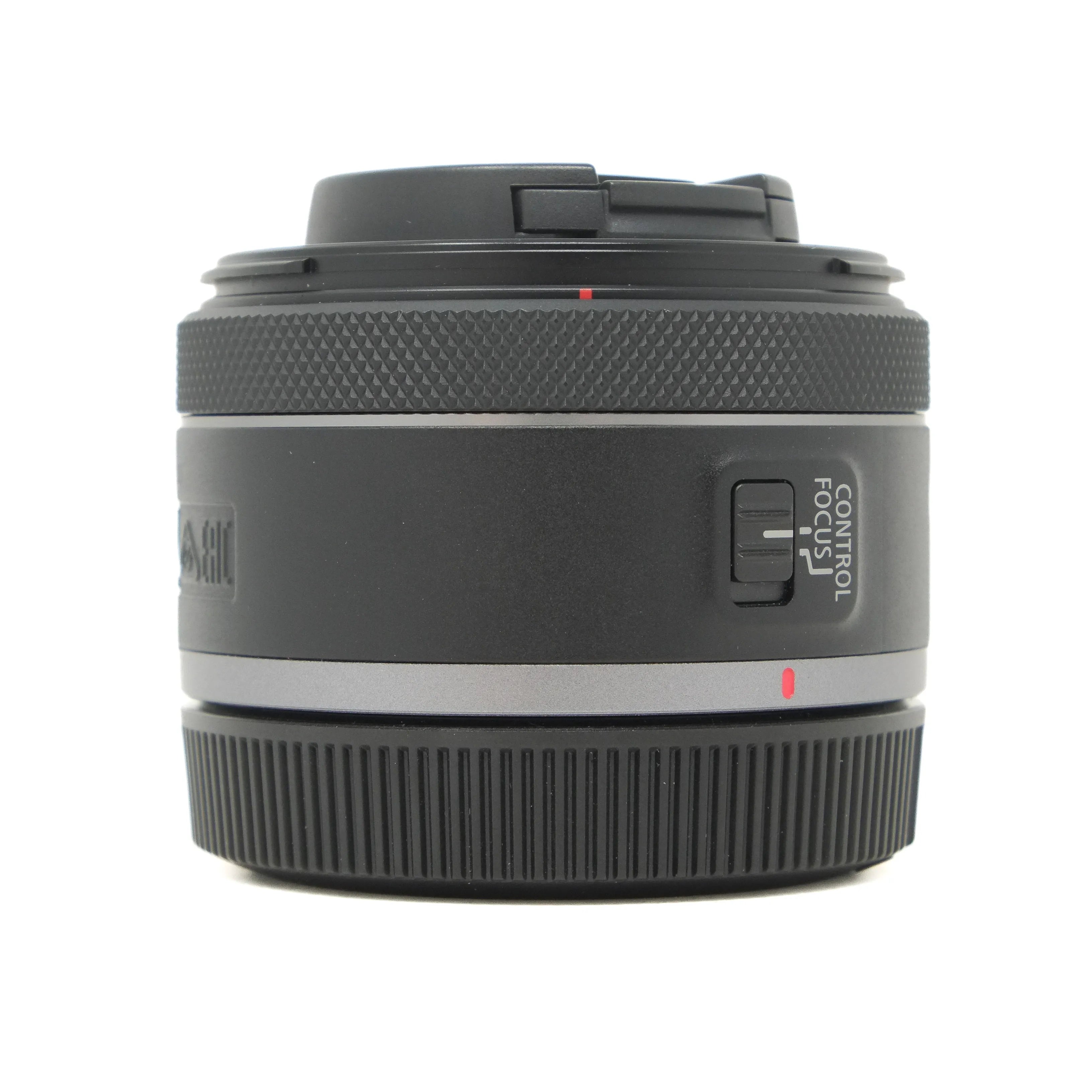Camera lens with control and focus switch on a white background