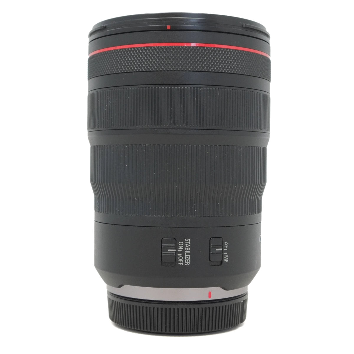 Camera lens with black and red design on a white background