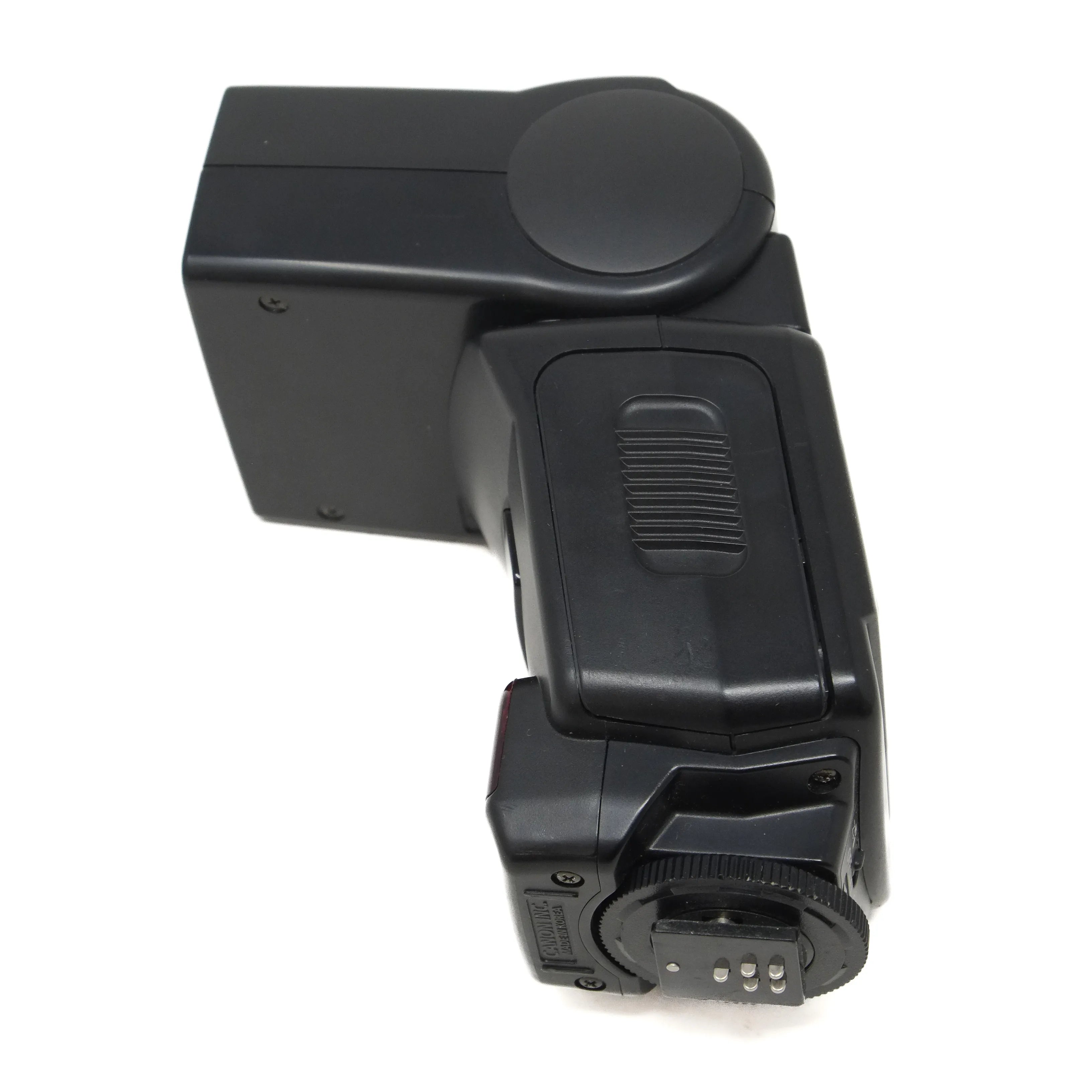 Black camera flash on a white background