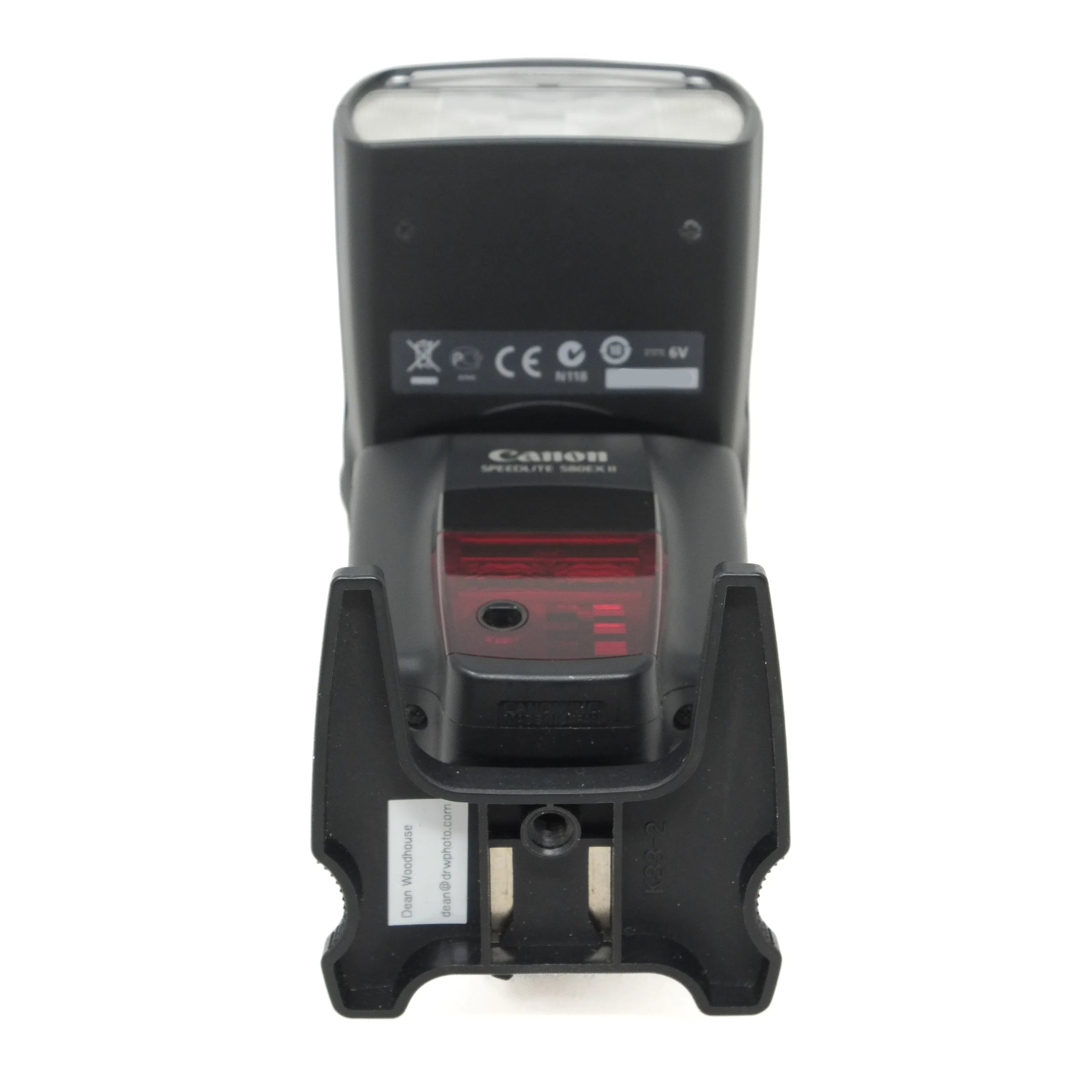 Canon flash unit on a white background