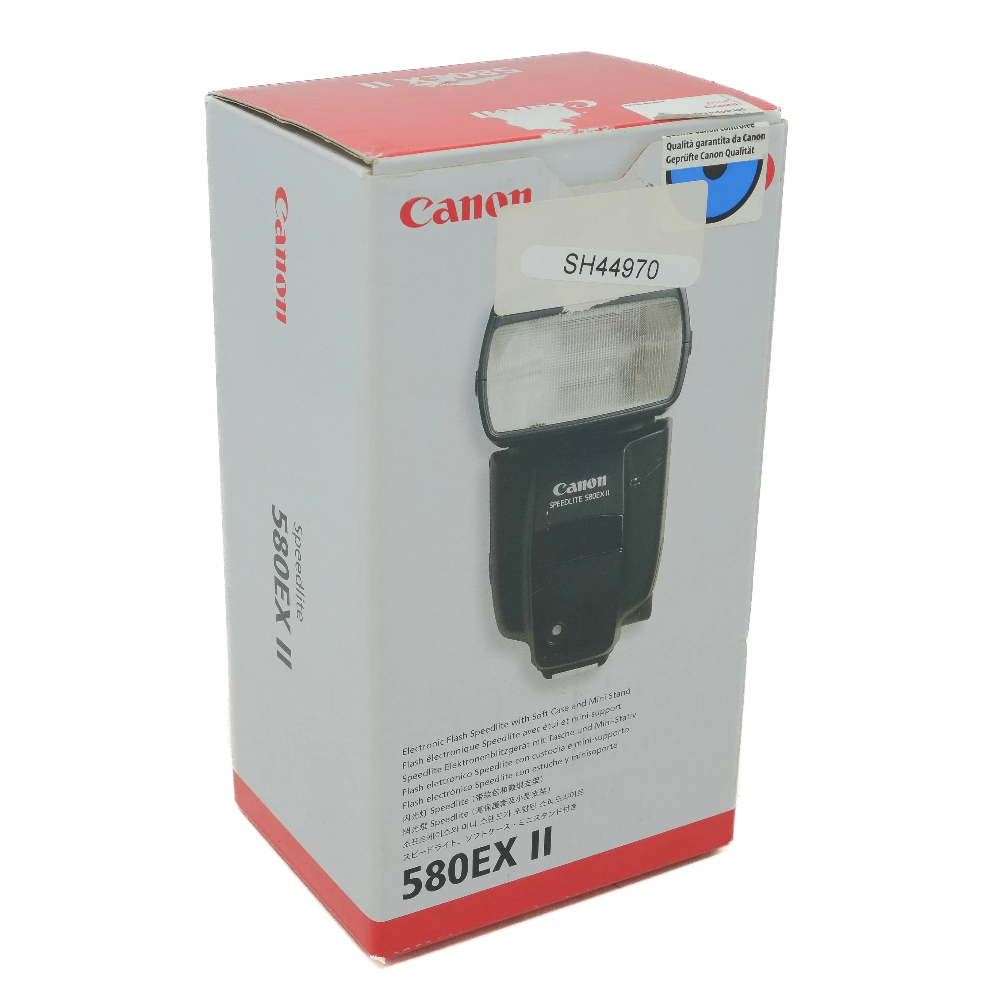 Canon 580EX II flash in packaging on a white background