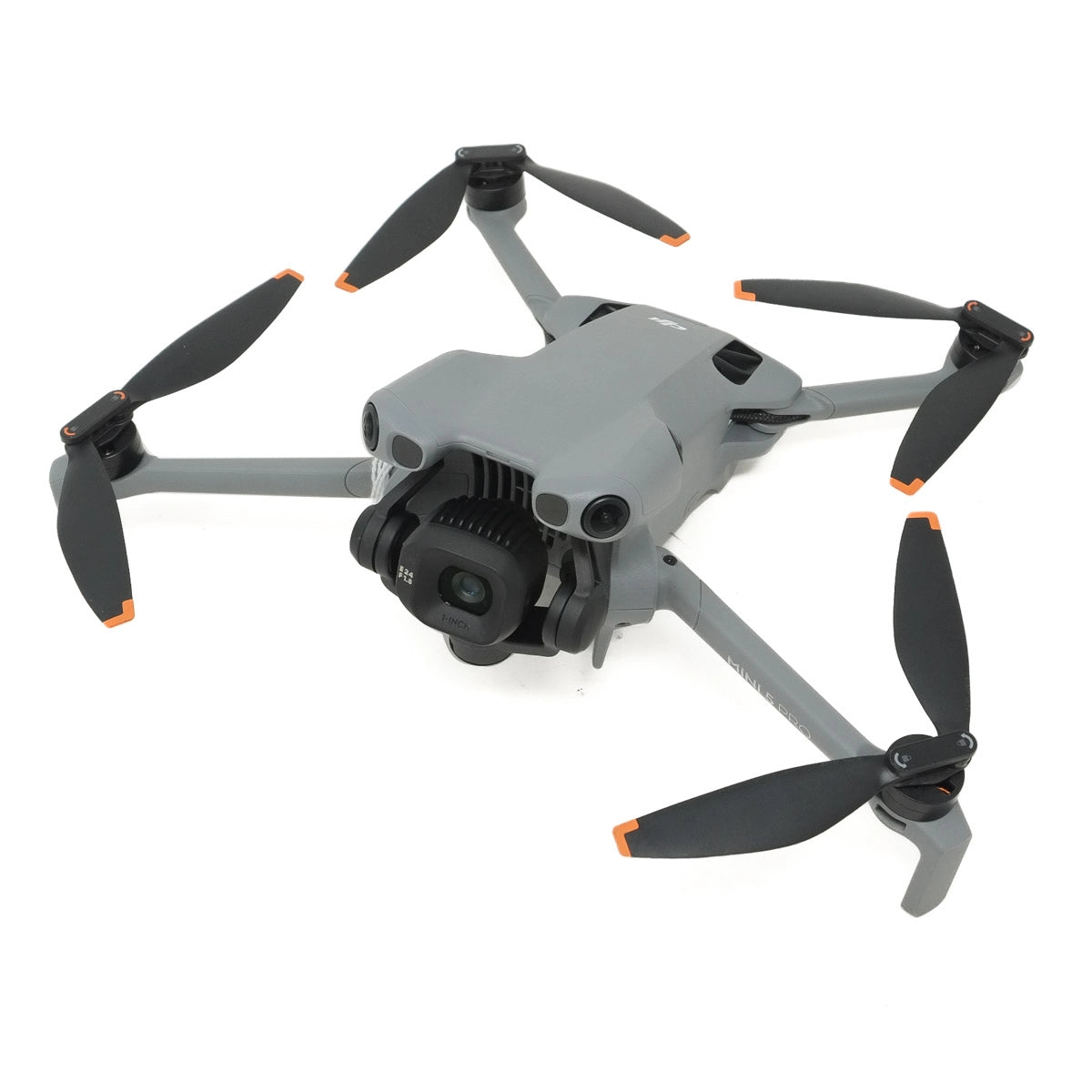 Gray drone with black propellers on a white background