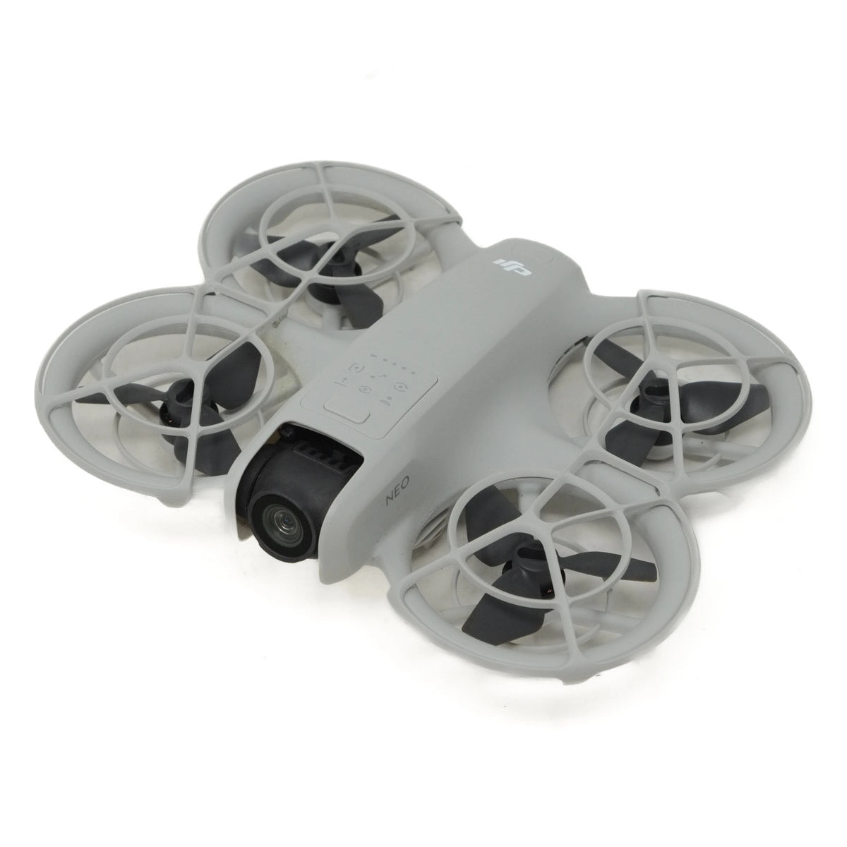 Gray drone with four propellers on a white background