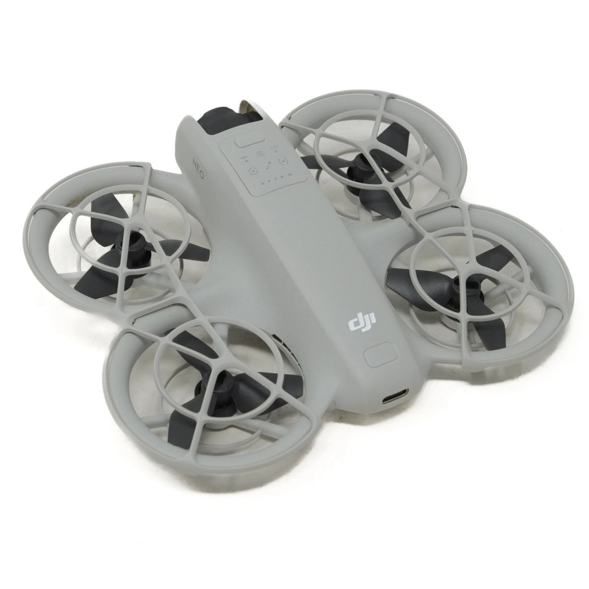 Gray drone with propellers on a white background