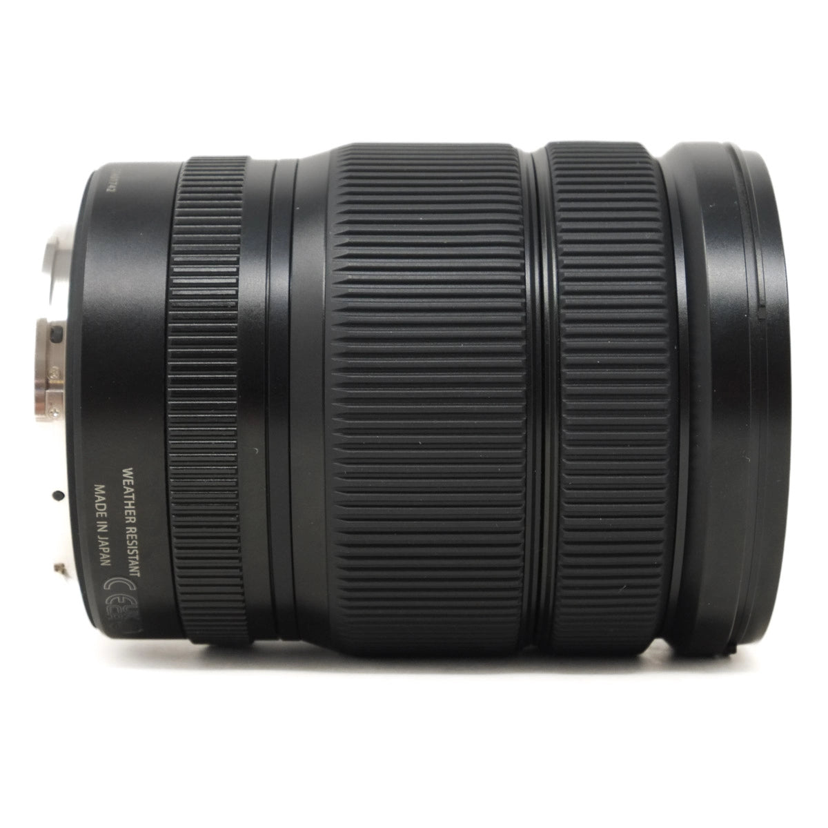 Black camera lens on a white background