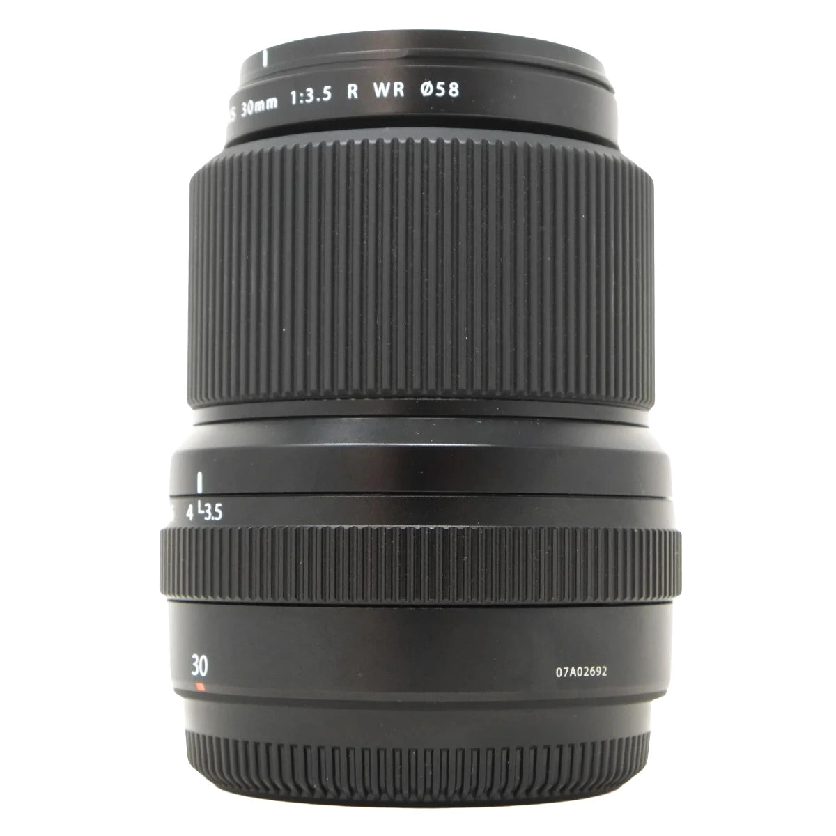 A black Fujifilm GF 30mm f/1.5 R WR camera lens with white text markings, shown against a plain white background.