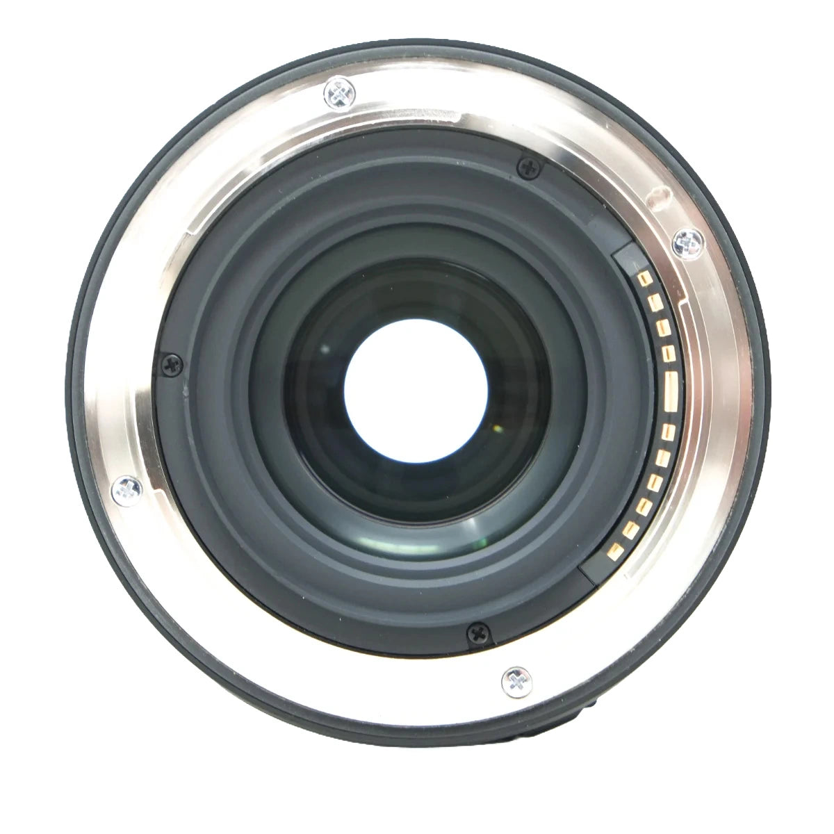 A close-up studio shot of a camera lens mount or lens back, showing the metallic silver outer ring, black rubber seal, dark gray internal rings, and gold contact pins on a white background.