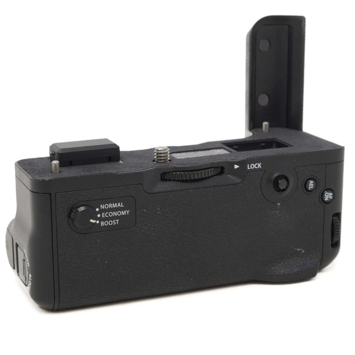 Black camera battery grip on a white background