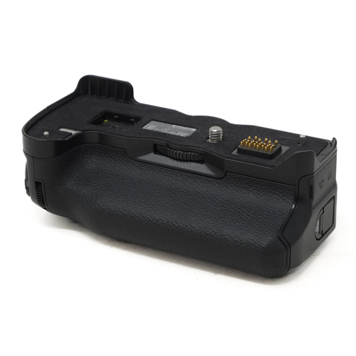 Black camera battery grip on a white background