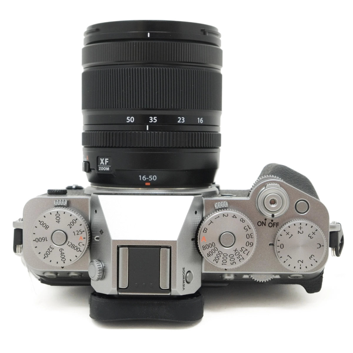 Camera body with lens on a white background