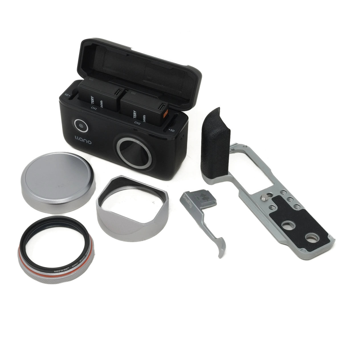 Collection of camera lens components and camera accessories on a white background