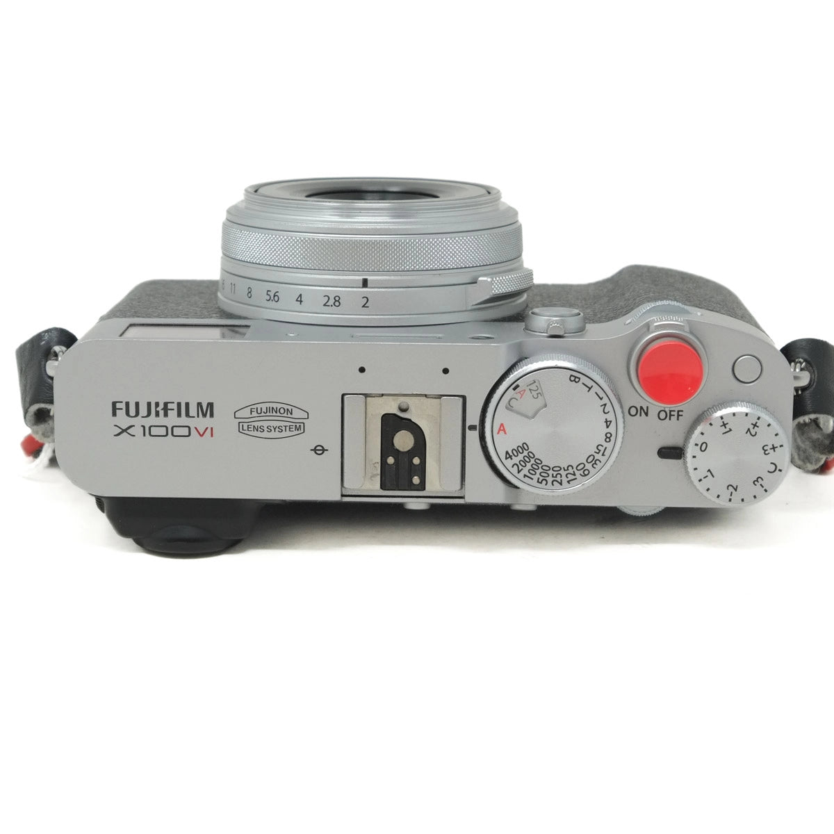 Silver Fujifilm camera on a white background