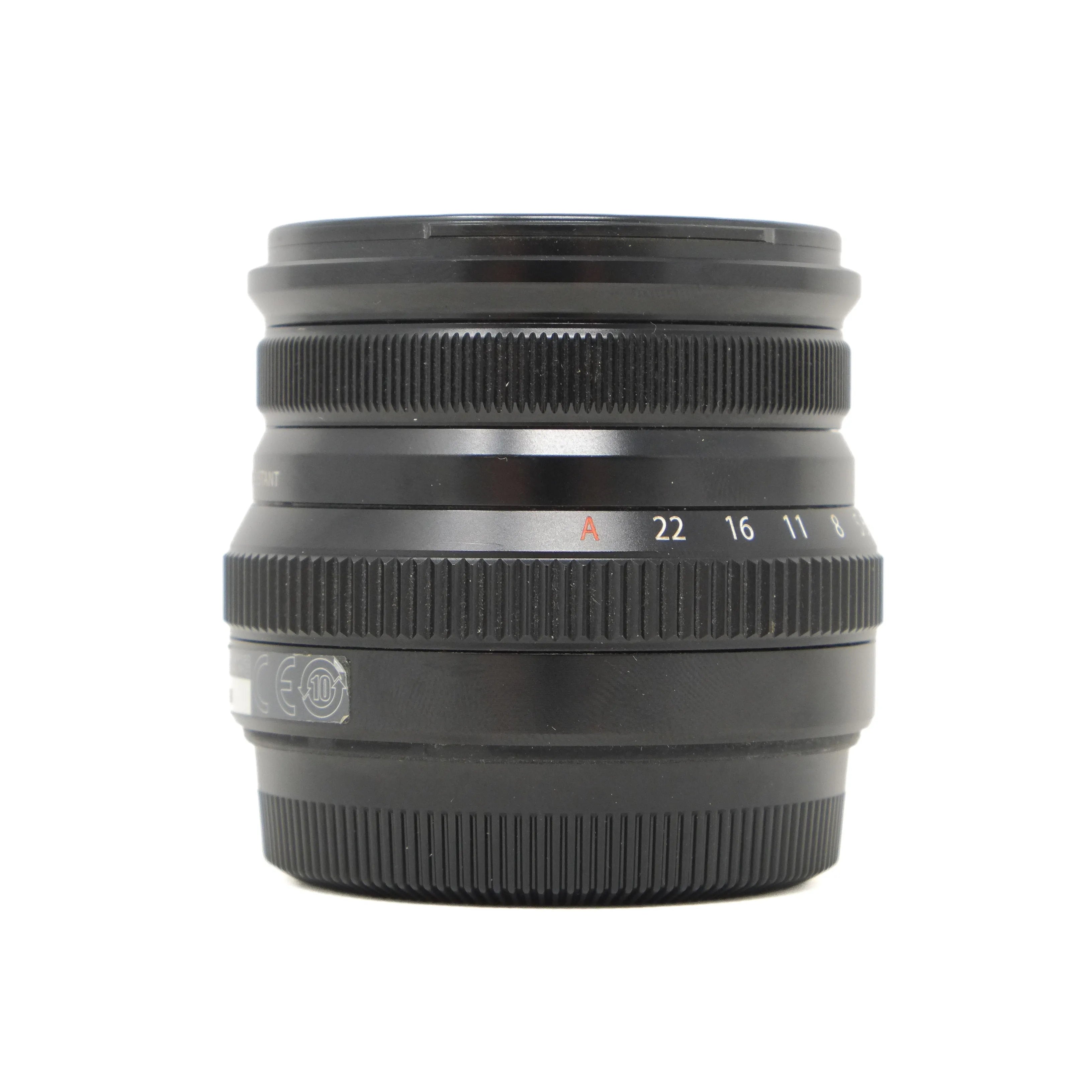 Black camera lens on a white background