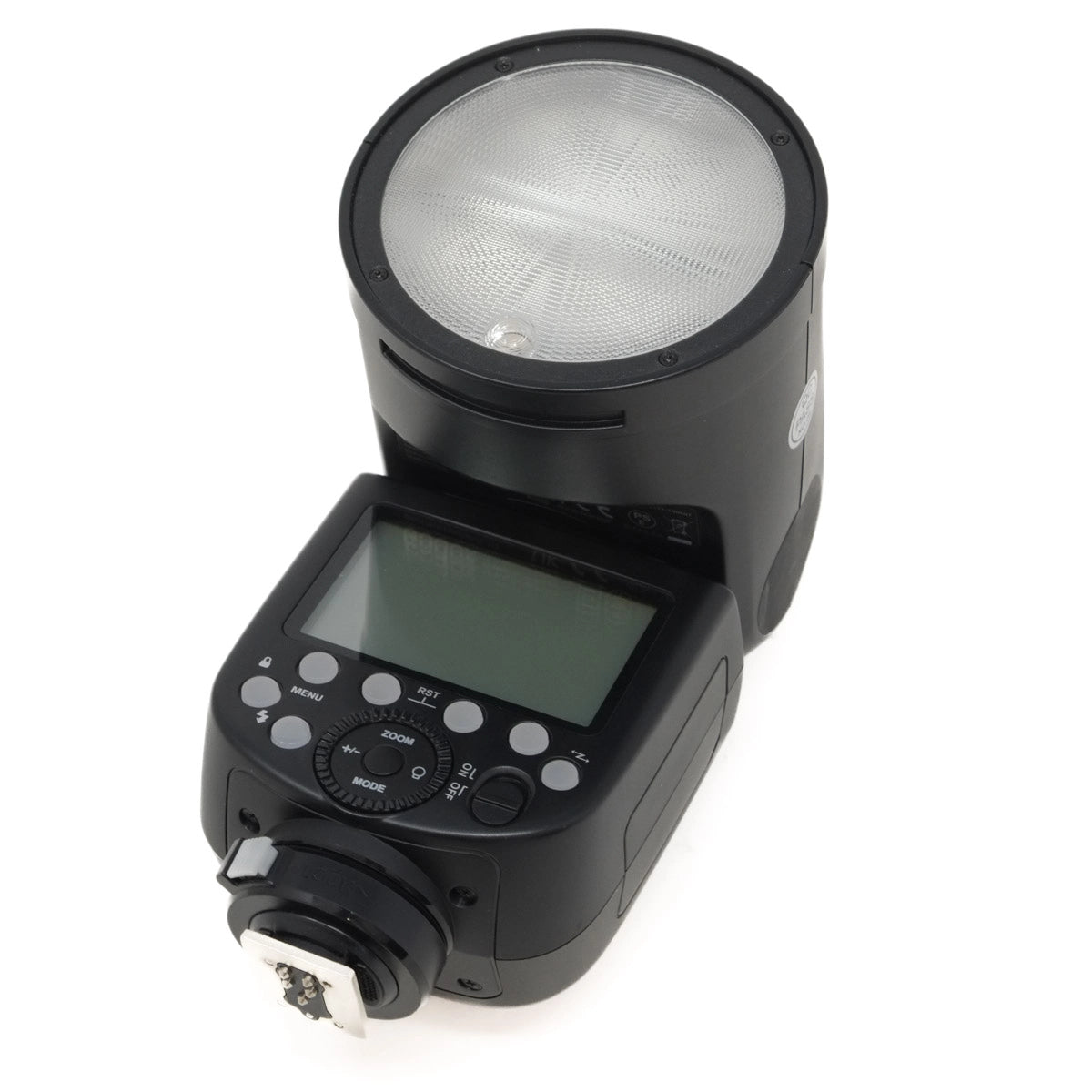 Black camera flash with digital display on a white background