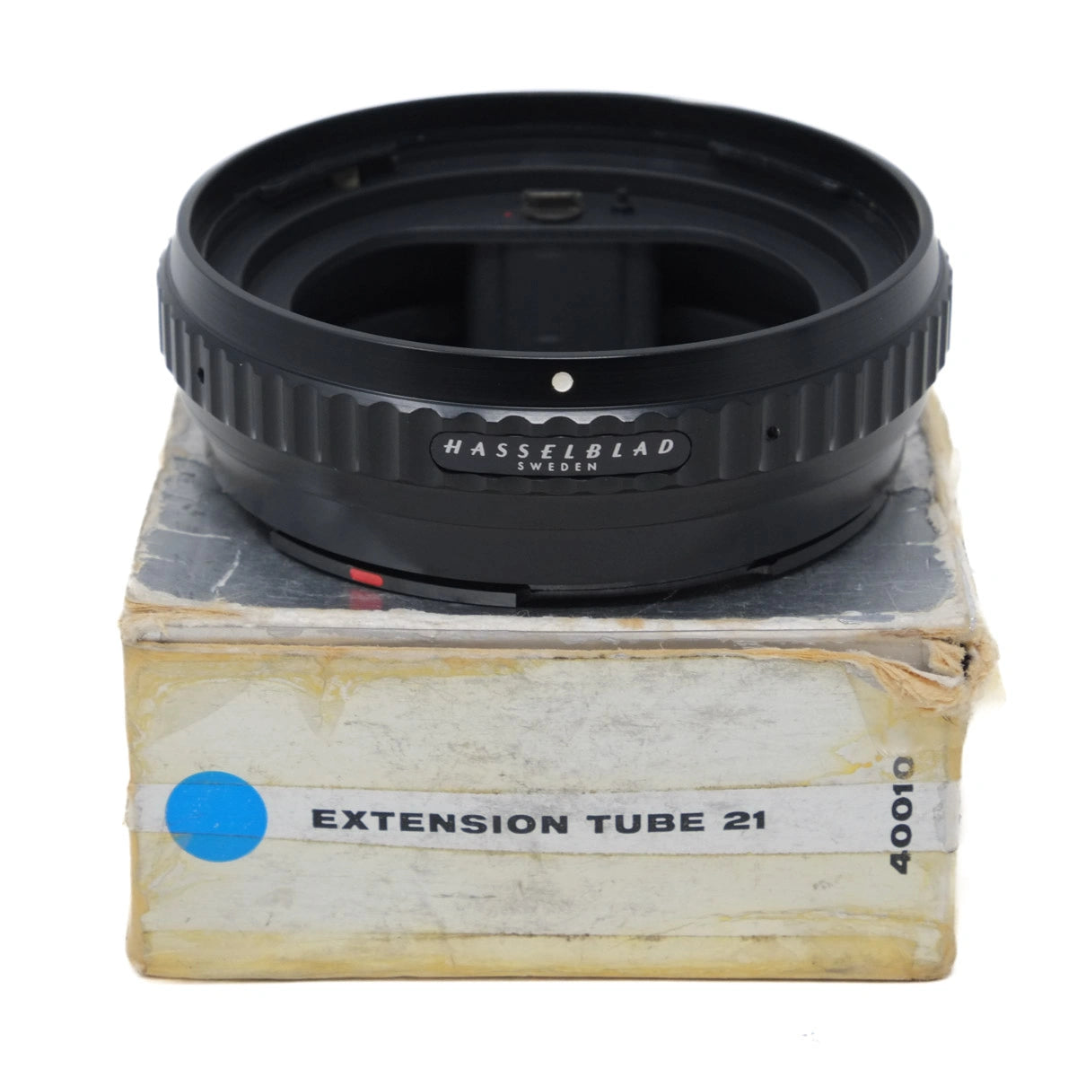 Hasselblad extension tube on a cardboard box with visible branding