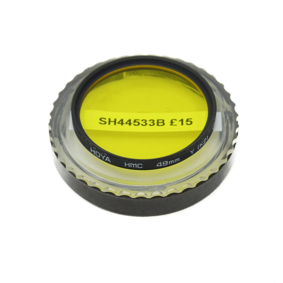 Yellow camera lens filter with black text and Hoya branding on a white background