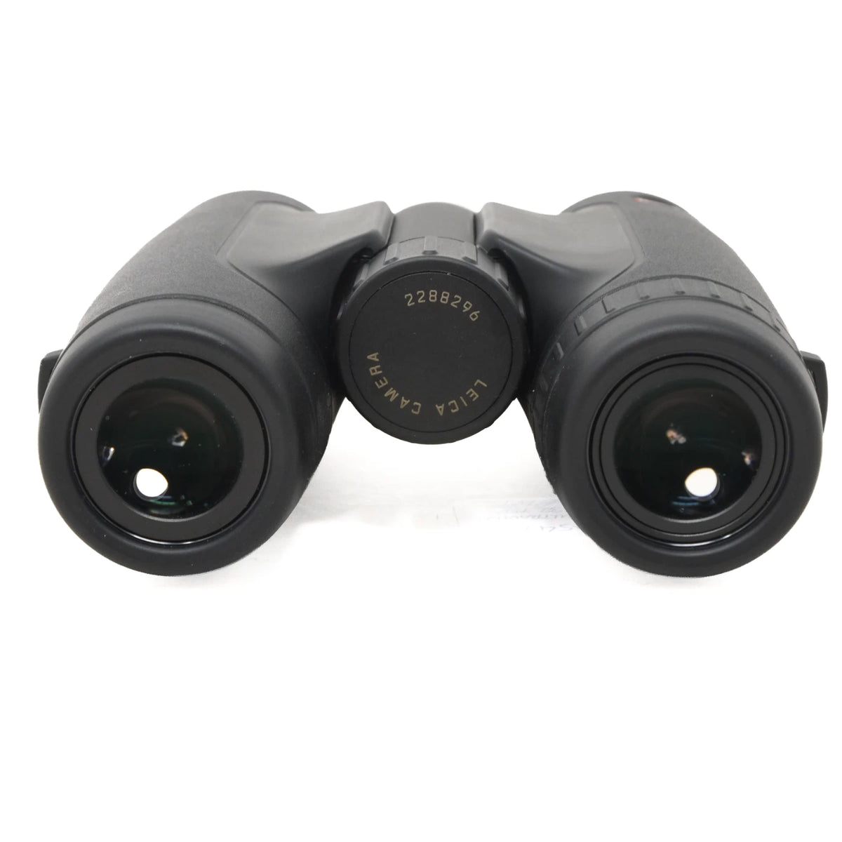 Black Leica binoculars photographed from the front on a clean white background.