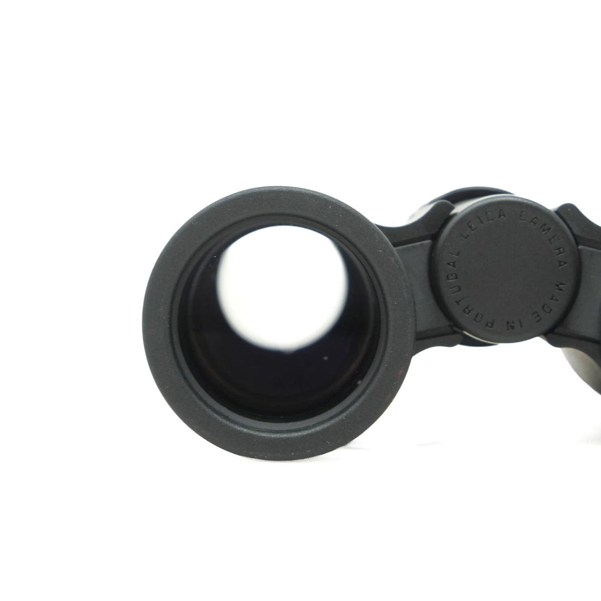 Close-up of a black Binocular eyepiece and magnifying lens assembly on a plain white background, with a circular adjustment knob.