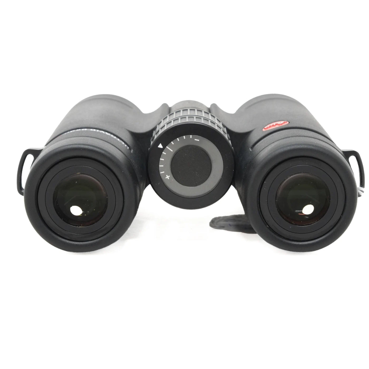 Black binoculars with a central focus wheel and side loops, photographed against a plain white background.