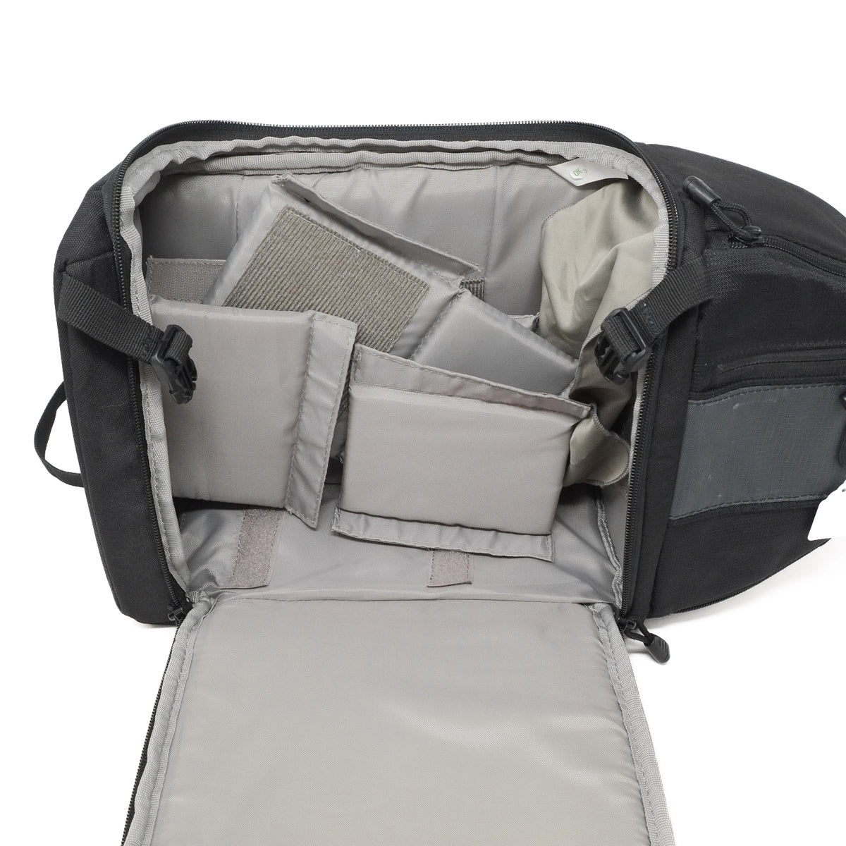 Open backpack showing interior compartments on a white background