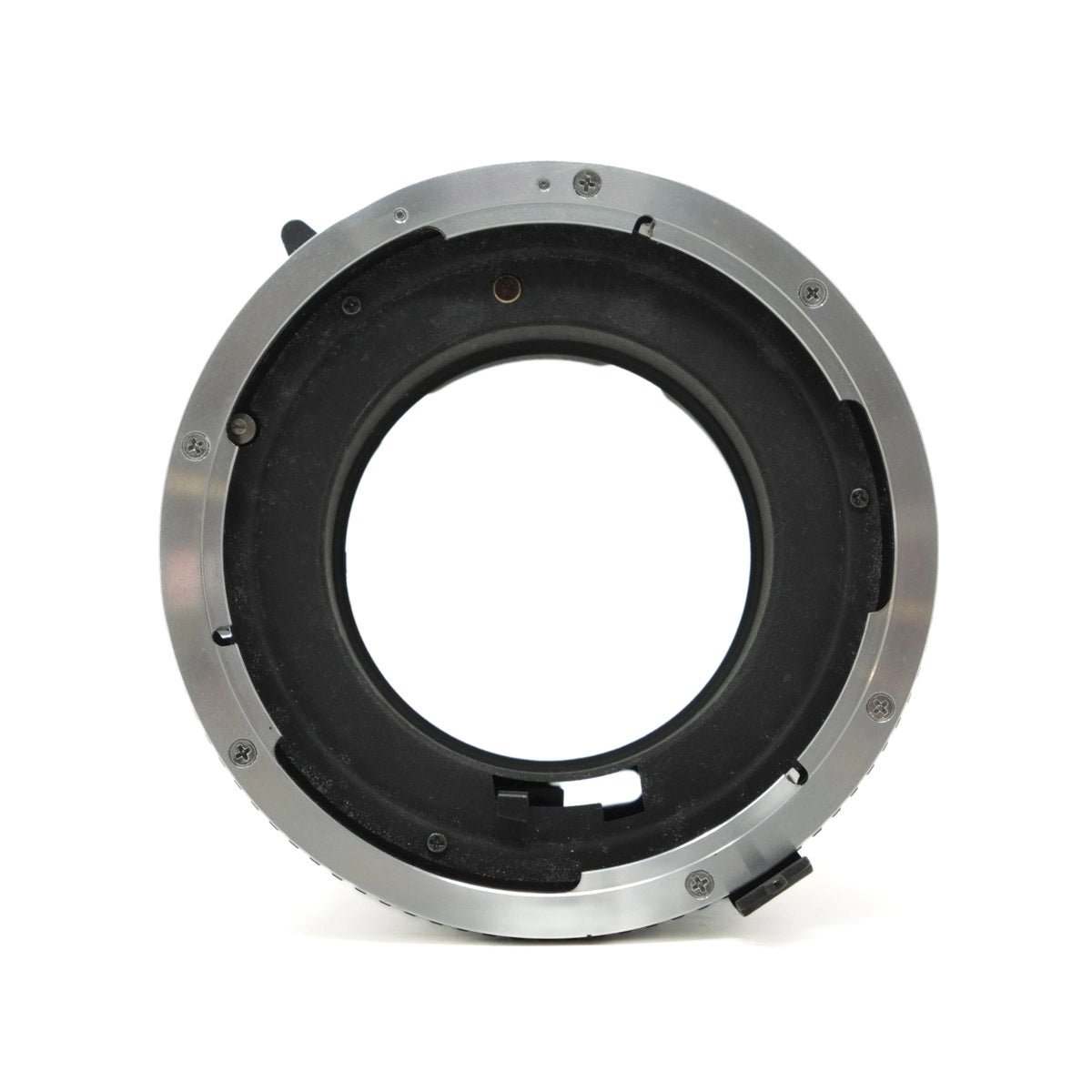 Camera lens extension tube on a white background