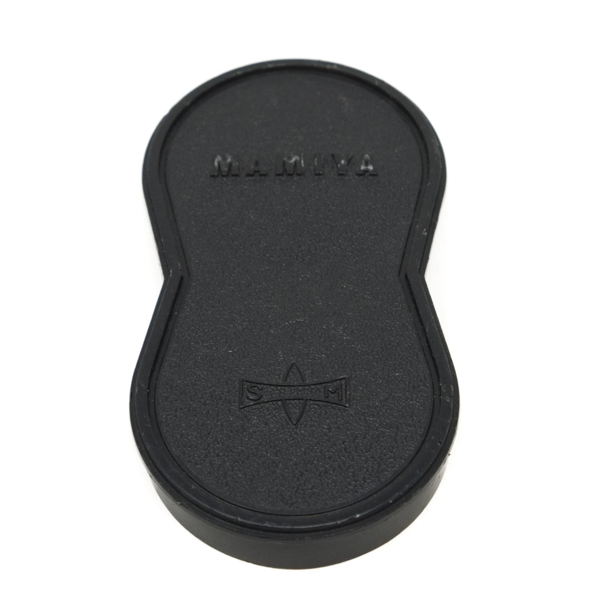 Black camera lens cap with 'Mamiya' branding on a white background
