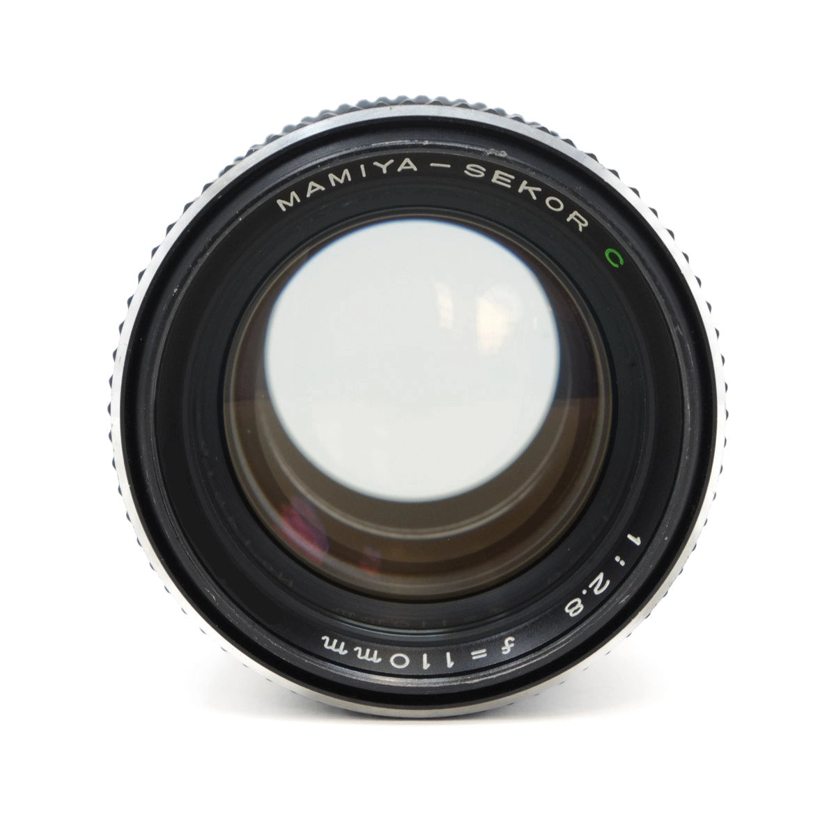 Mamiya-Sekor camera lens on a white background