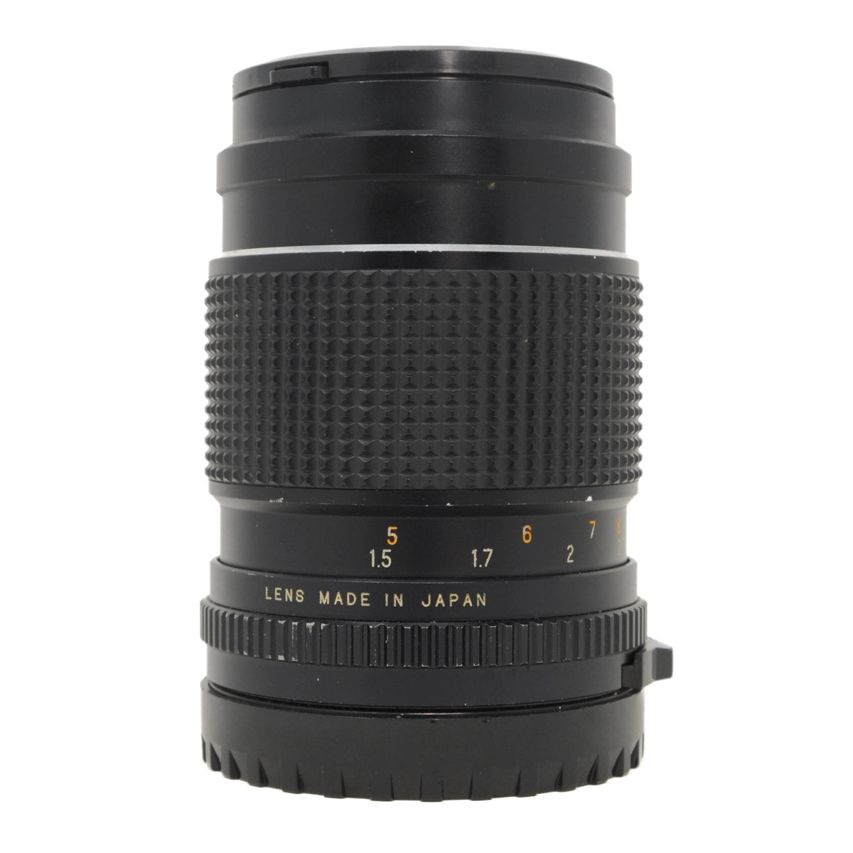 Black camera lens with text 'Lens Made in Japan' on a white background