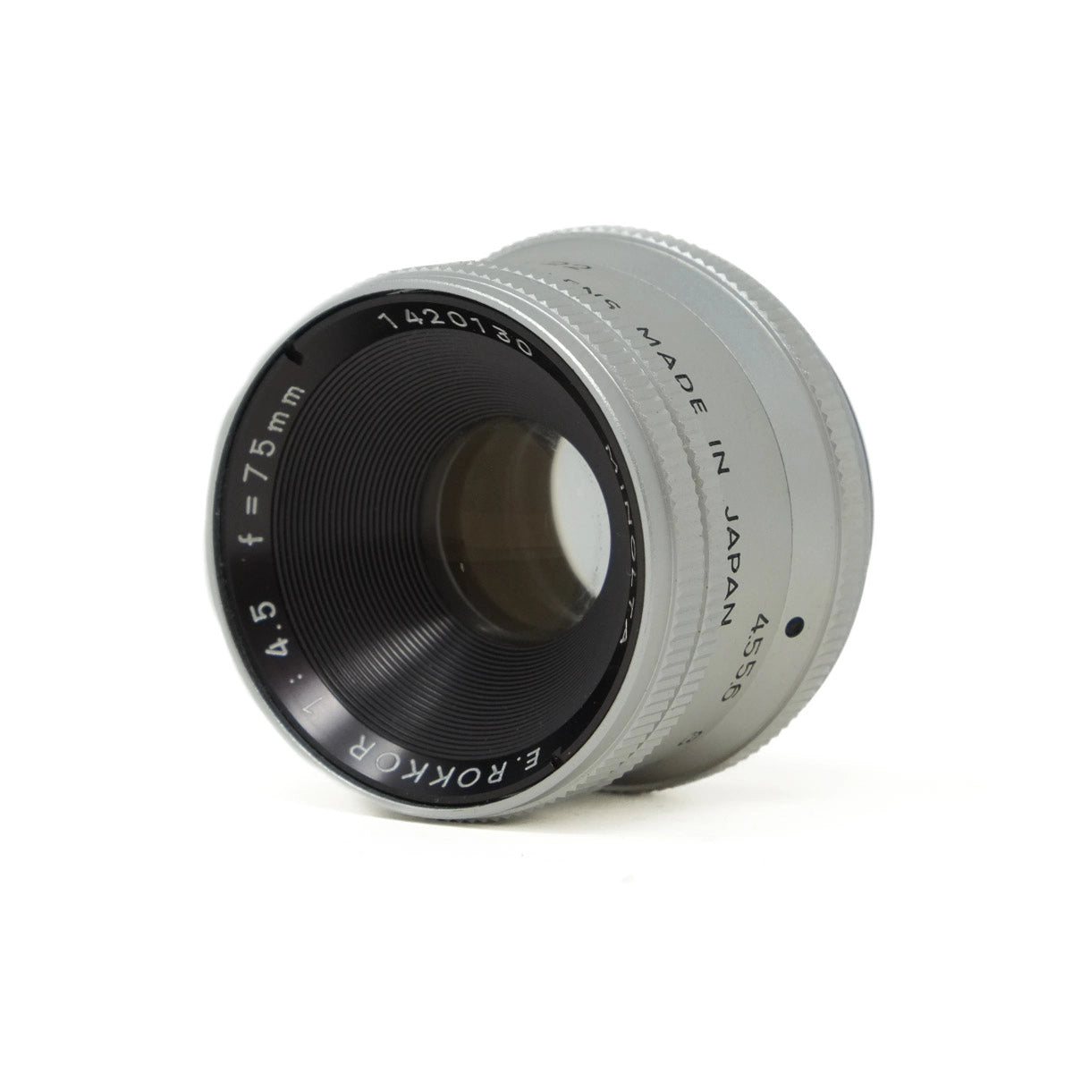 Camera lens with 'Made in Japan' text on a white background