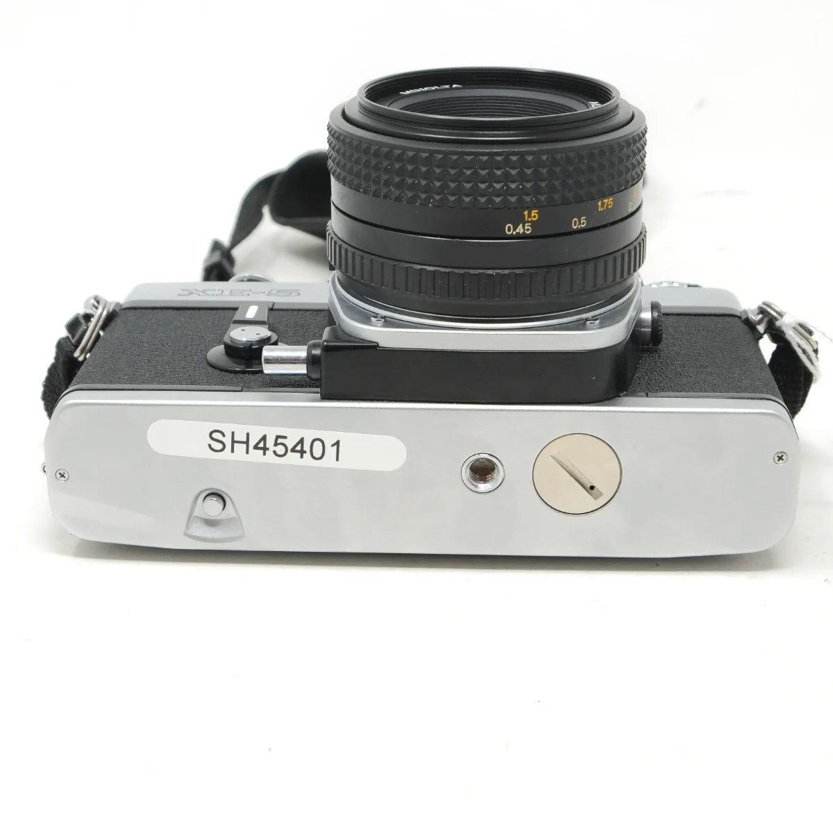 Used Minolta XE-5 film camera with 50mm F2 - bottom angle 