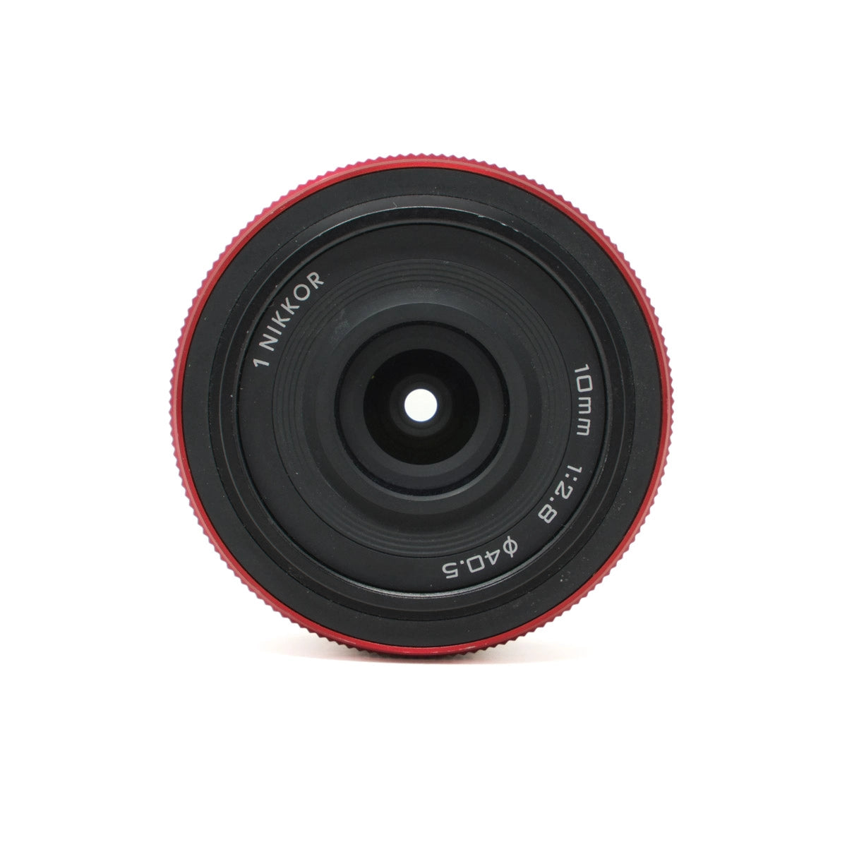 Camera lens with red rim and 'Nikkor' branding on a white background