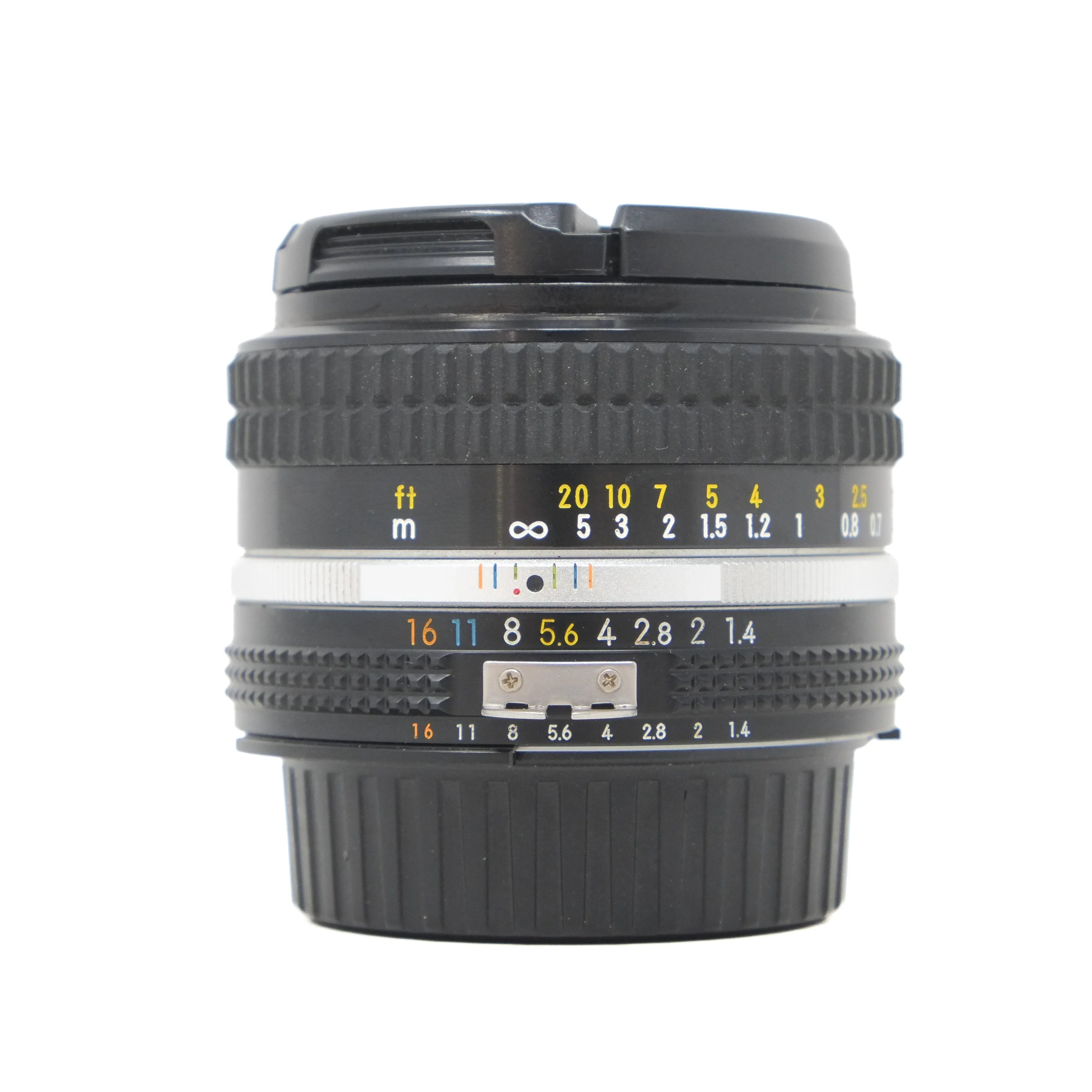 Camera lens with focus and aperture scale on a white background