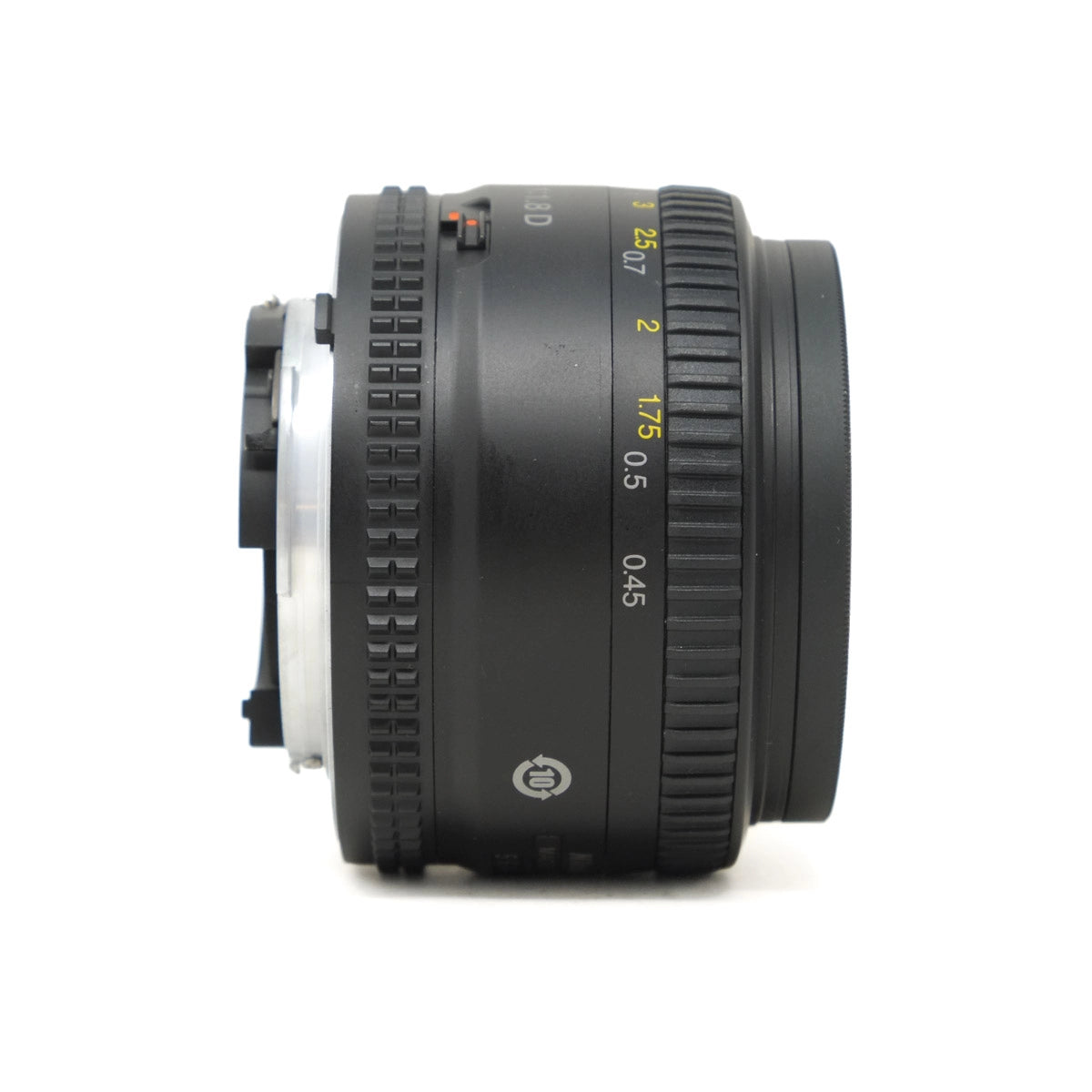 Camera lens with focus scale on a white background