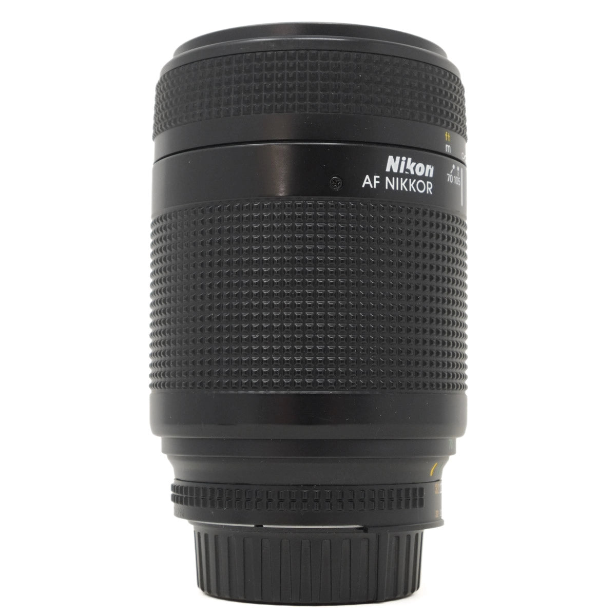 Nikon AF Nikkor camera lens on a white background