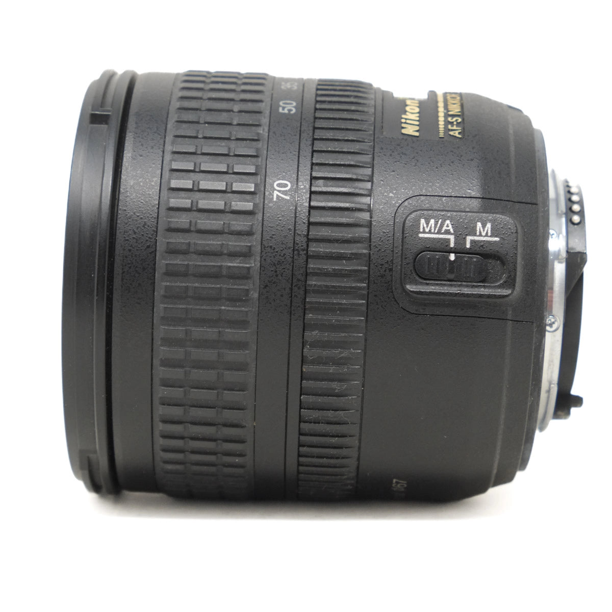 Camera lens with Nikon branding on a white background