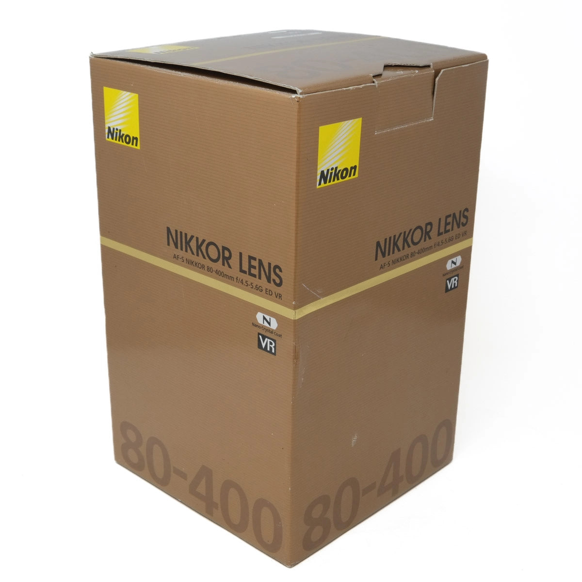 Cardboard box with Nikon Nikkor lens branding on a white background