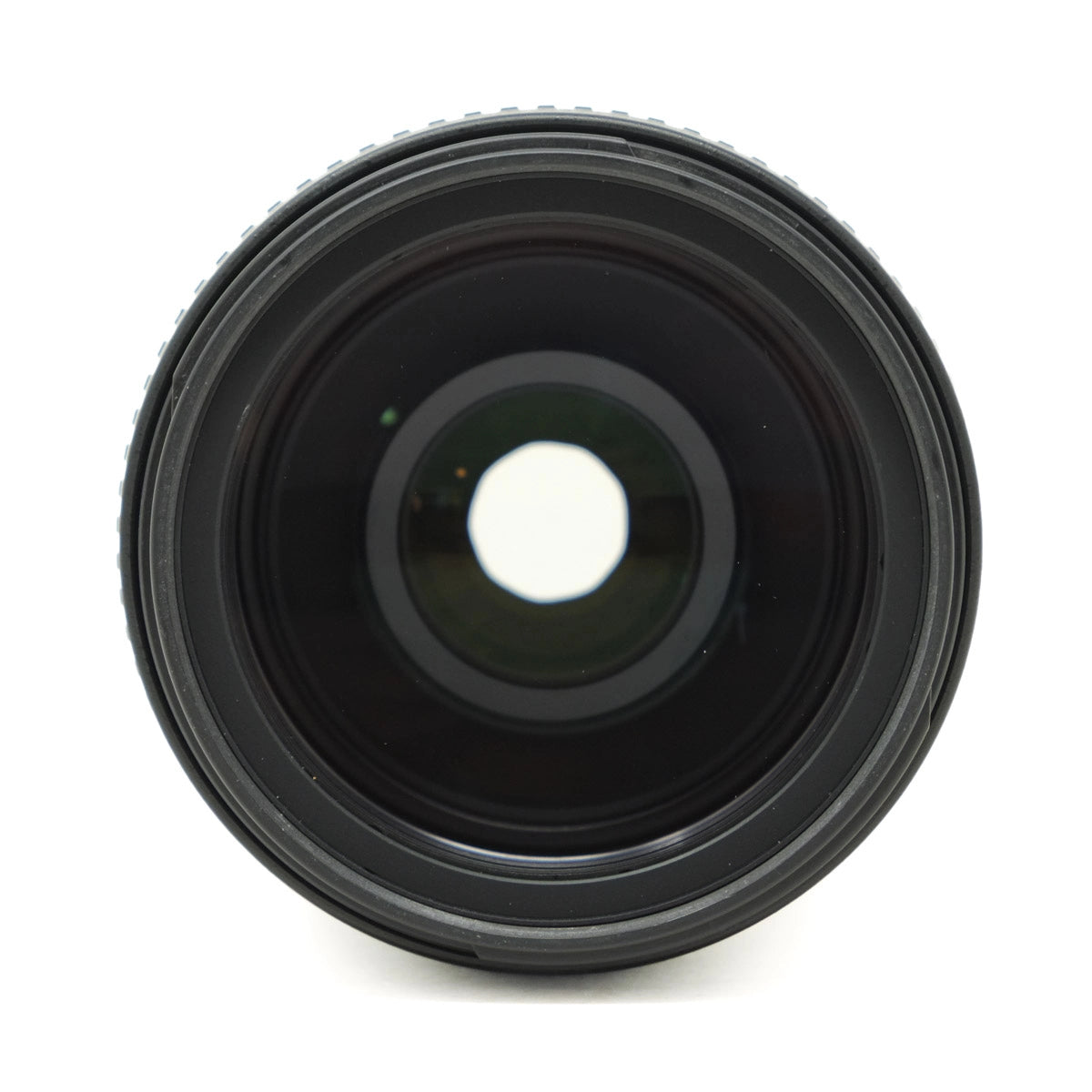Black camera lens on a white background