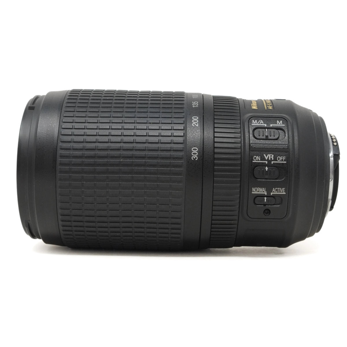 Camera lens with control buttons on a white background