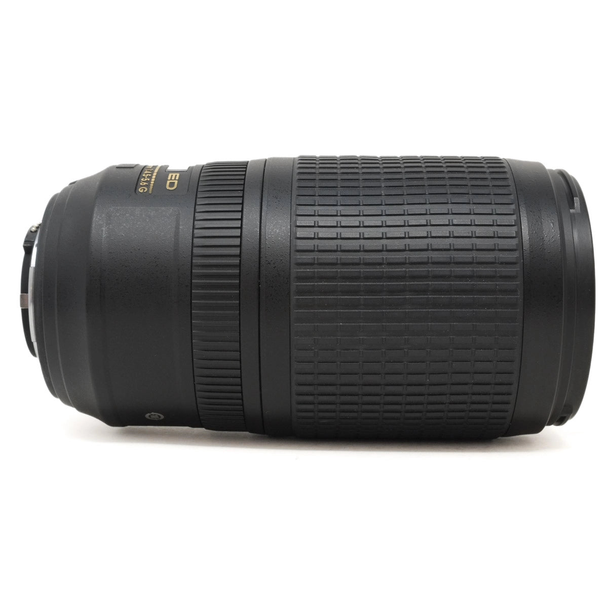 Camera lens with 'AF-S' and 'Nikon' branding on a white background